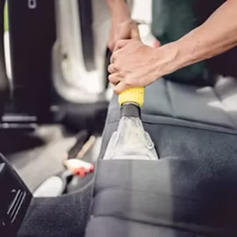 Steam-cleaning fabric seat upholstery